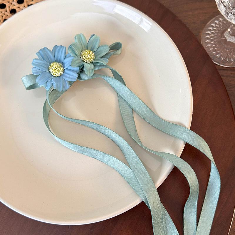 

Нова маленька свіжа шпилька з бантом з ромашками та стрічкою. Мила маленька дівчинка, затискач з подвійним хвостиком, головний убір з боковим затискачем зелений