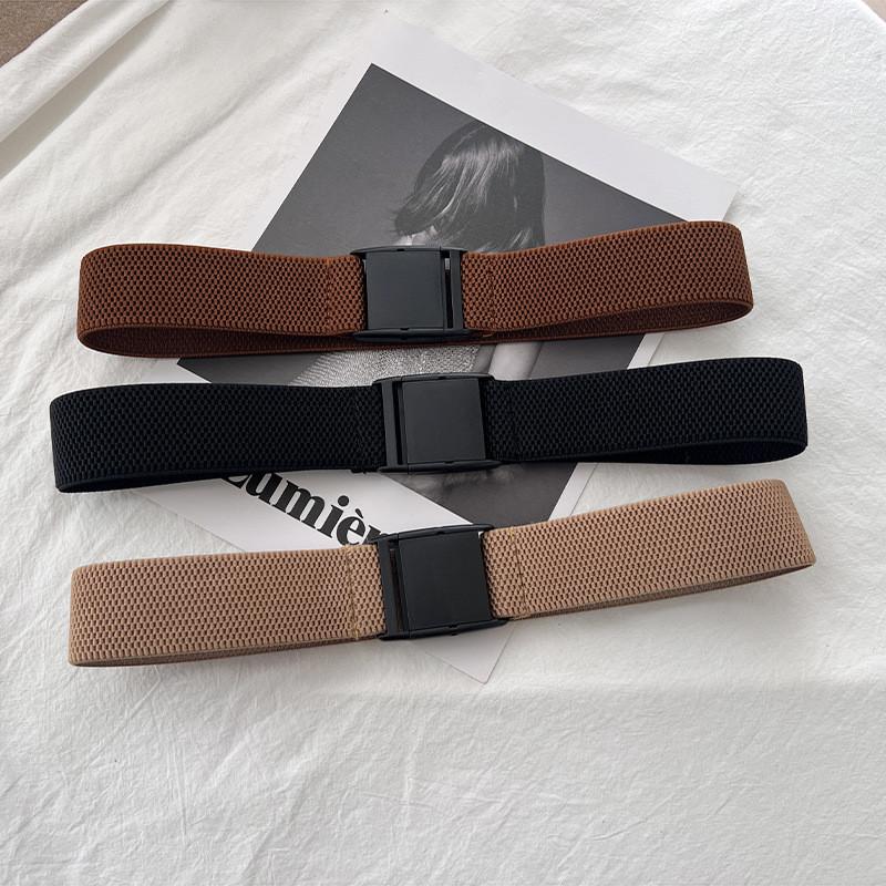 Elastic Versatile Waist Belt For Women Featuring Stylish Plastic Fastener In Elegant Black