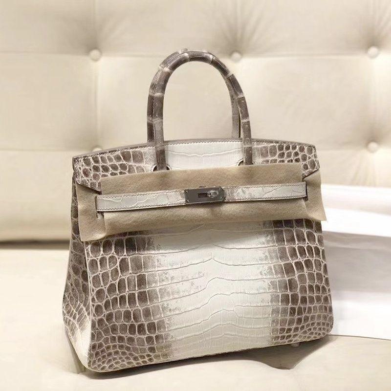La borsa da donna Yijinyuan ha solo trent'anni. Stessa Borsa. Borsa a Mano in Vera Pelle con Fantasia Coccodrillo a Gradiente Platino 2021. Pendolare.