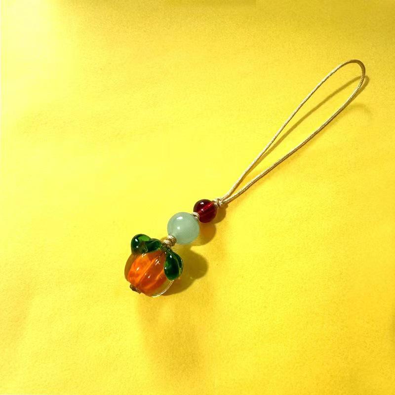 

Ключниця з персимоном, що виконує бажання: Ретро китайський стиль з підвіскою у вигляді листя хурми, що приносить успіх.