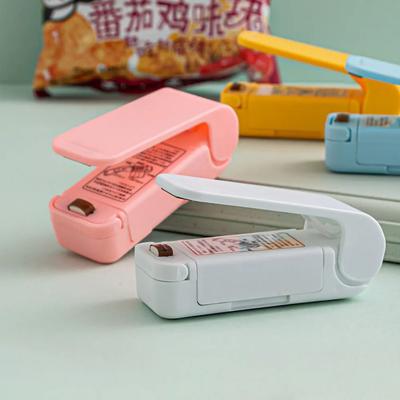 Mini sigillatrice per sacchetti alimentari, pressa manuale, clip per sigillare sacchetti di plastica, sigillatrice per sacchetti di conservazione regolabile a 2 velocità, utensile da cucina a prova di umidità