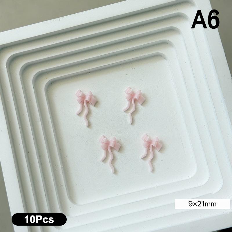 10 Stück Doppellagige Schleifen-Nagelanhänger 3D Süße Band-Schleifen Nagelkunst Strasssteine Mini Harz-Fliege Maniküre Schmuck DIY Teile