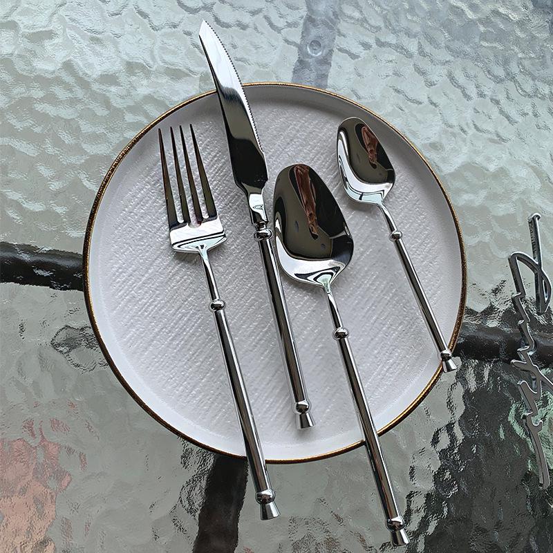 Elegant 304 Stainless Steel European Cutlery Set: Thickened Steak Knife, Fork, and Spoon for Hotel, Restaurant, or Home Use.