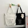 Simple autumn and winter new bag women's texture atmospheric canvas bag student class schoolbag cartoon handbag bag
