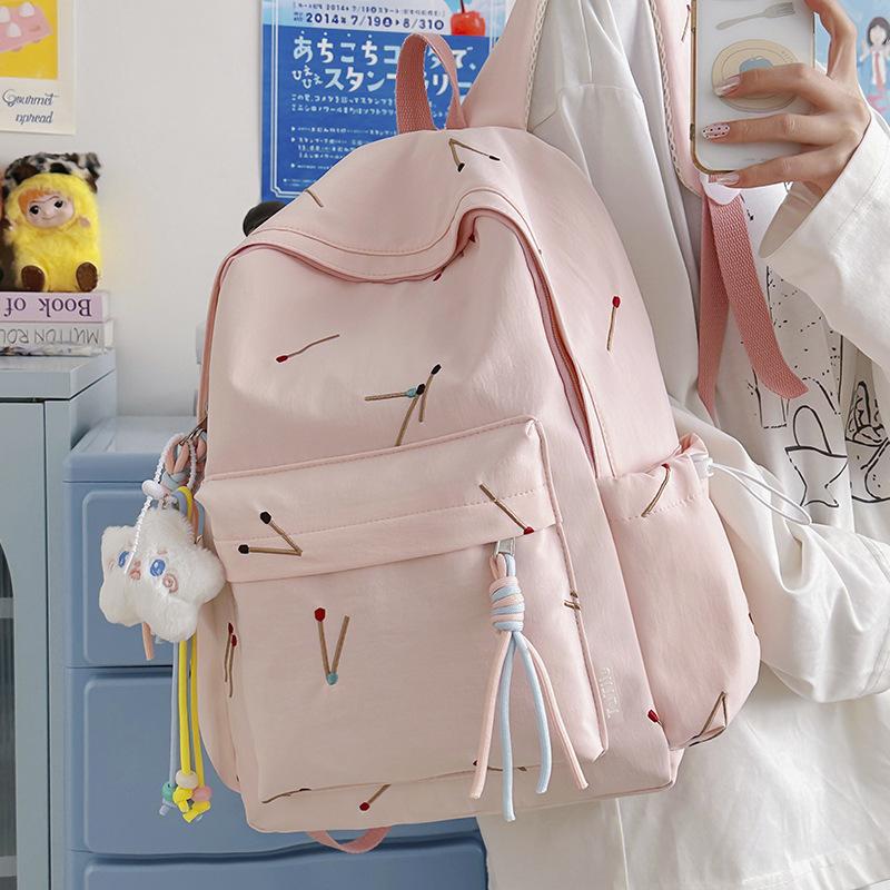 Matchstick Print Backpack for Women and Girls Fashion School Travel Daypack with Tassel Detail