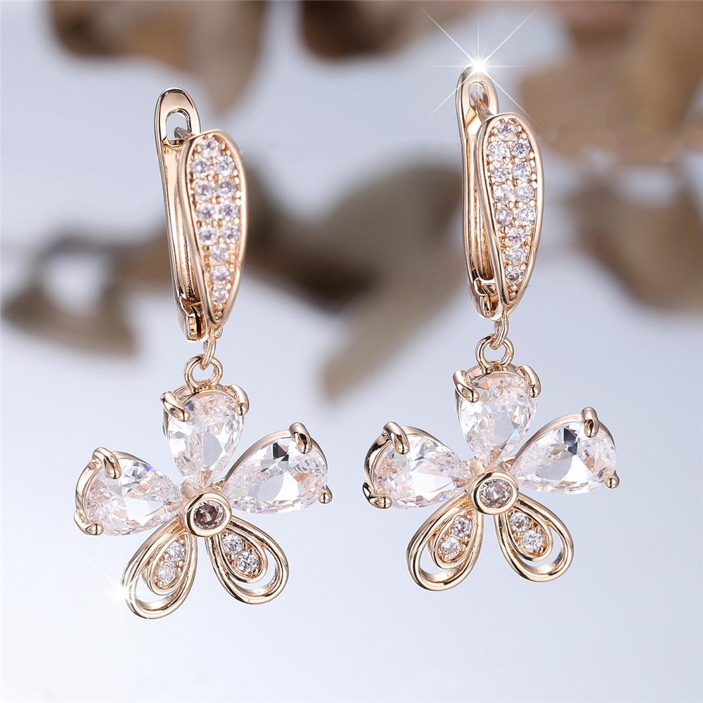 

New micro-inlaid zircon flower ear buckle sweet and cute lady small fresh petal earrings fairy wind