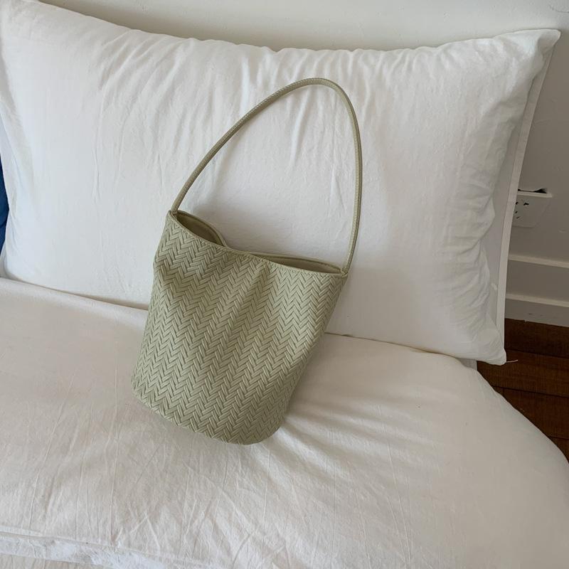 

Niche high-end handbag small bag women s 2025 new woven bucket bag simple shoulder armpit bag бірюзовий