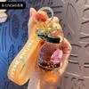 Cartoon oil floating liquid quicksand bottle pearl milk tea bear key chain cute trendy car key chain pendant Key Ring