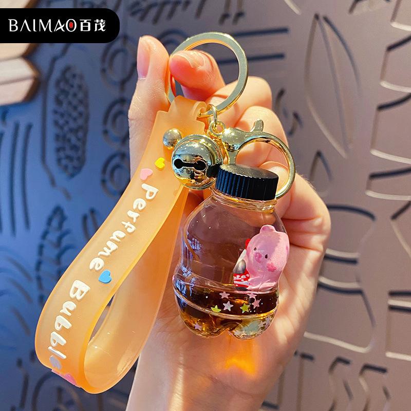 Cartoon oil floating liquid quicksand bottle pearl milk tea bear key chain cute trendy car key chain pendant Key Ring