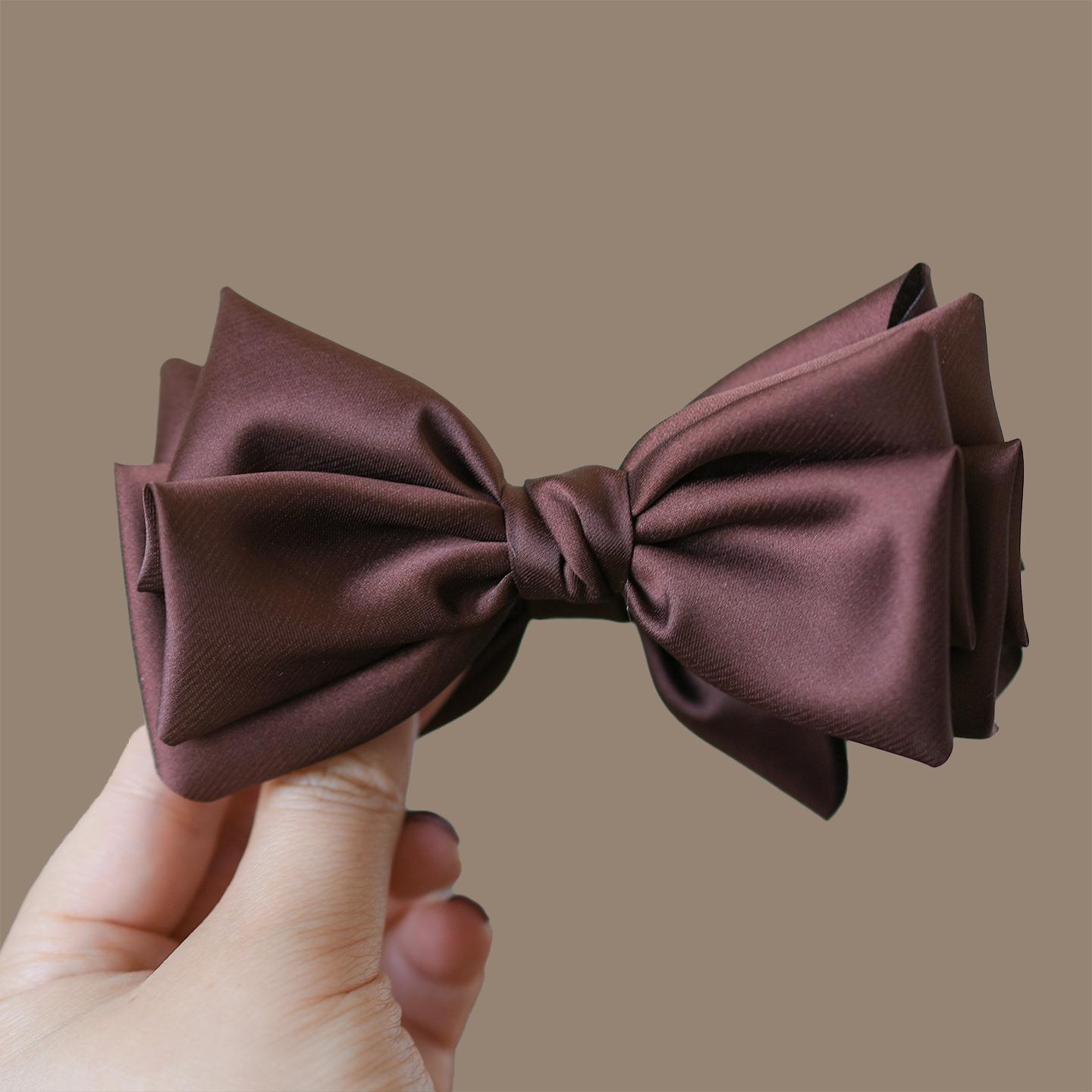 

Elegant Solid Color Bow Banana Clip for Women - Enhances Ponytail and Adds Fullness