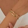 Gold Serrated Chain Bracelet with Black and White Crystal Drop Charms for Women