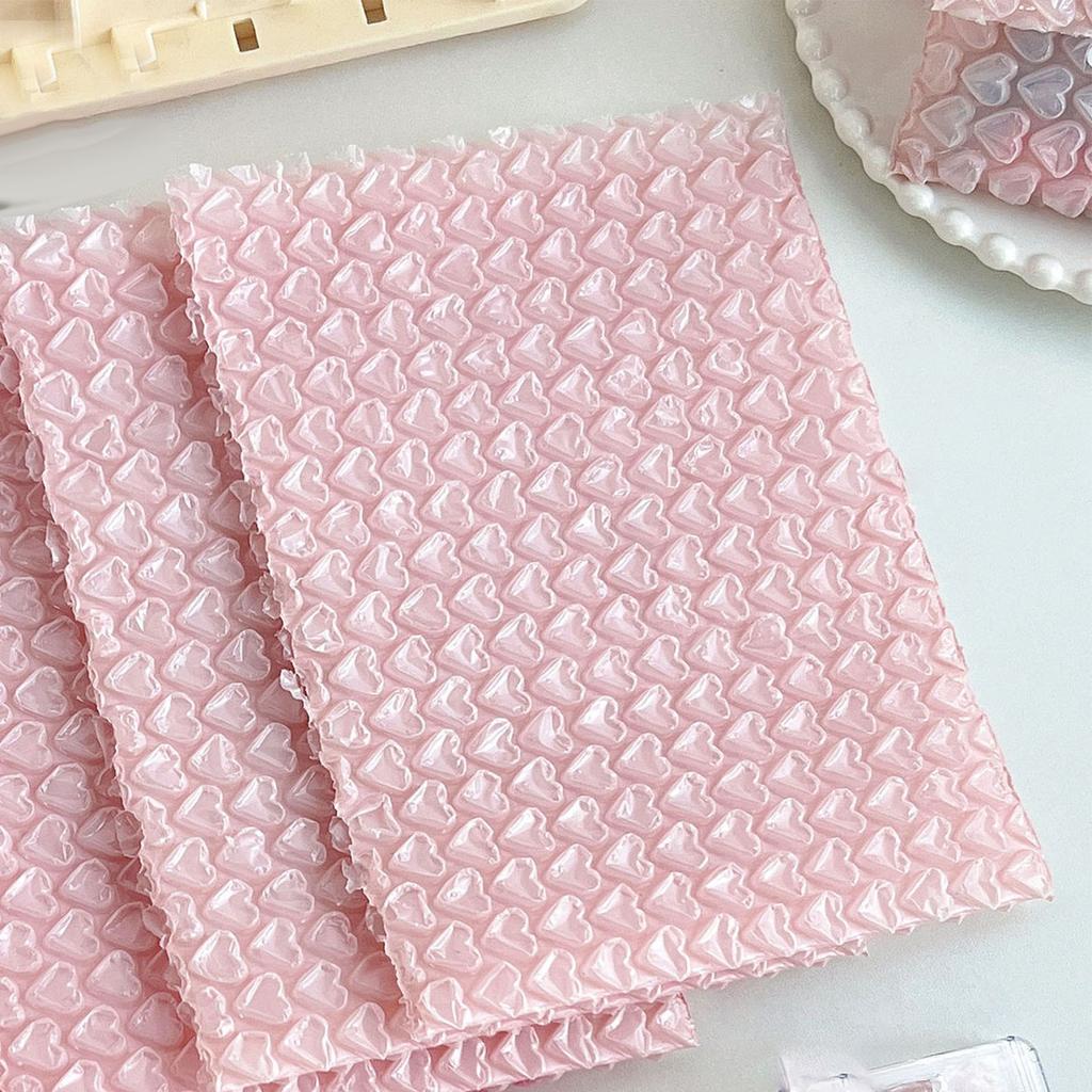Kleine Luftpolstertaschen PE Rosa Herzmuster Stoßfest Wasserdicht Luftpolsterungstaschen zum Verpacken Expressversand