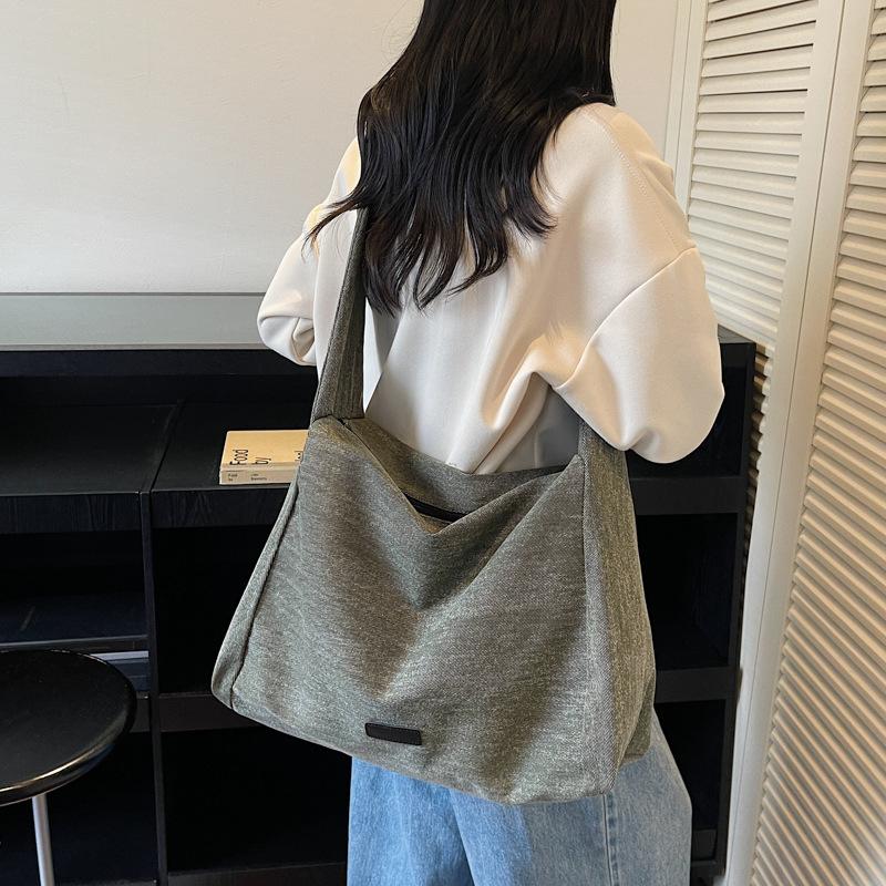 Japanese commuter canvas bag women's 2025 autumn new fashion simple trendy large-capacity college student shoulder tote bag