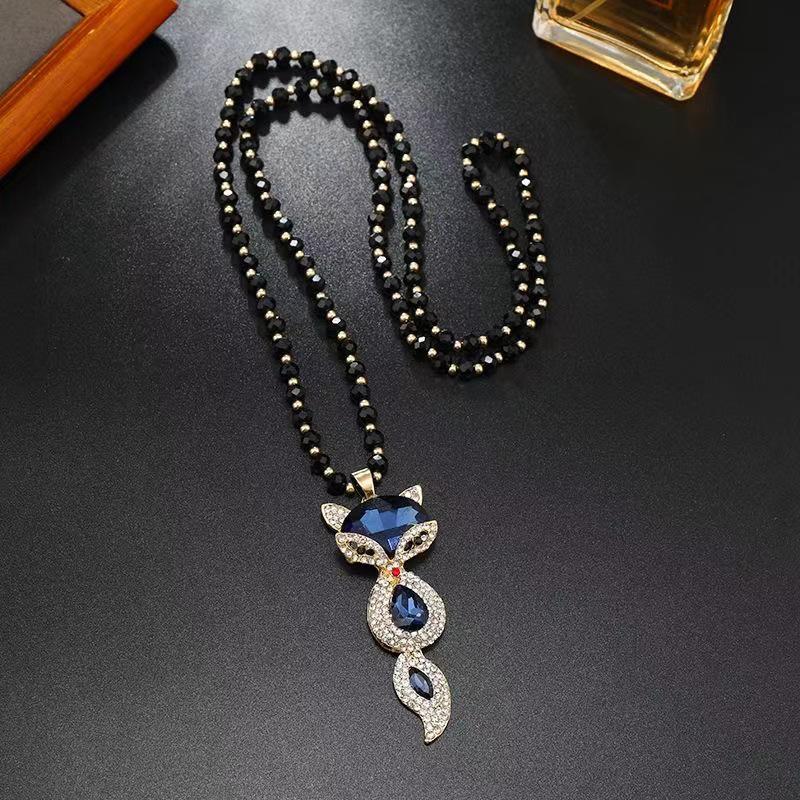 Elegant Cat's Eye Fox Pendant Necklace: Autumn/Winter Stylish Sweater Chain for Women
