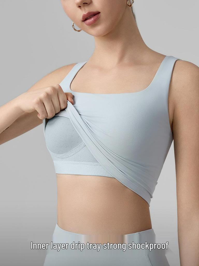 Damen Sport-Tanktop mit Schmetterlingsrücken und stoßfestem BH, festen Cups, ideal für Pilates und Yoga.