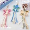 Explosive exquisite handmade woven flower tassel bag pendant with rustic style and creative car keychain pendant