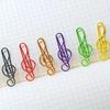 10 Color note shaped paper clips randomly selected