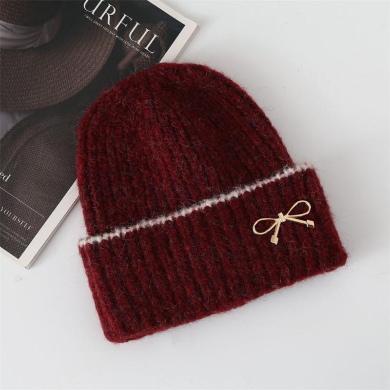 New autumn and winter women's bow knitted hat big head circumference thickened warm ear protector wool hat shows small face cold hat