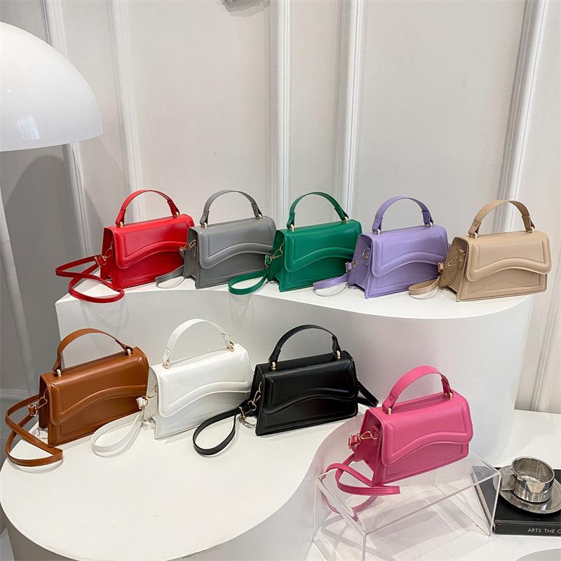 Personalized trend contrasting colors, fashionable and simple 2025 summer indentation new single shoulder oblique span portable small square bag
