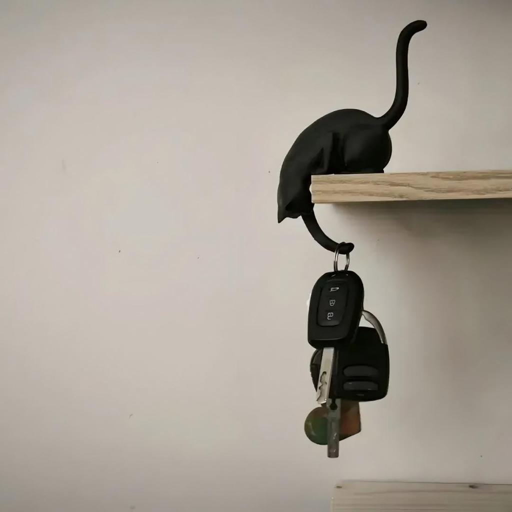 A Cat-Shaped Wall Hook Featuring a Cat Hanging Upside Down with One Paw Extended This Cat Can Hold Keys Pendants And Other Small Items