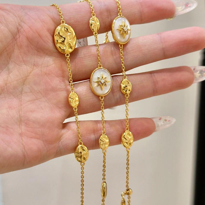 Französischer Luxus Perlmutt Stern Schmuckset: Halskette, Armband, Ring, Ohrringe mit Quaste und Diamantakzent