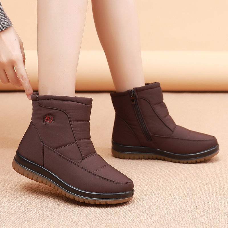 

Snow boots women s winter 2025 new fashion short boots thickened cotton shoes short boots velvet flat bottom mother cotton shoes 42