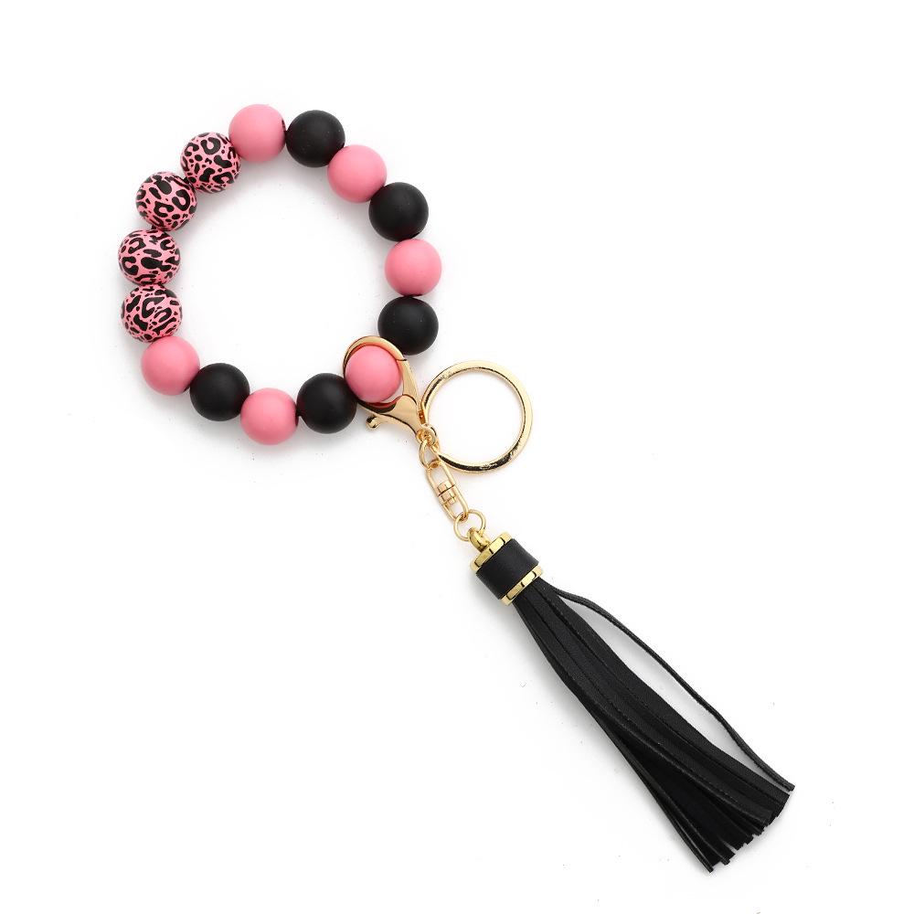 2023 Retro Wooden Bead Bracelet with Leather Tassel Keychain for Women Leopard Wood Bead Bracelet with 10cm Tassel