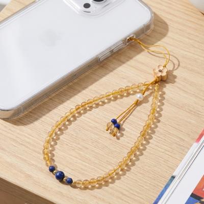 Chaîne de téléphone naturelle en cristal doré pour femmes, style bracelet, cordon de téléphone exquis haut de gamme, mode de niche, vintage et artistique