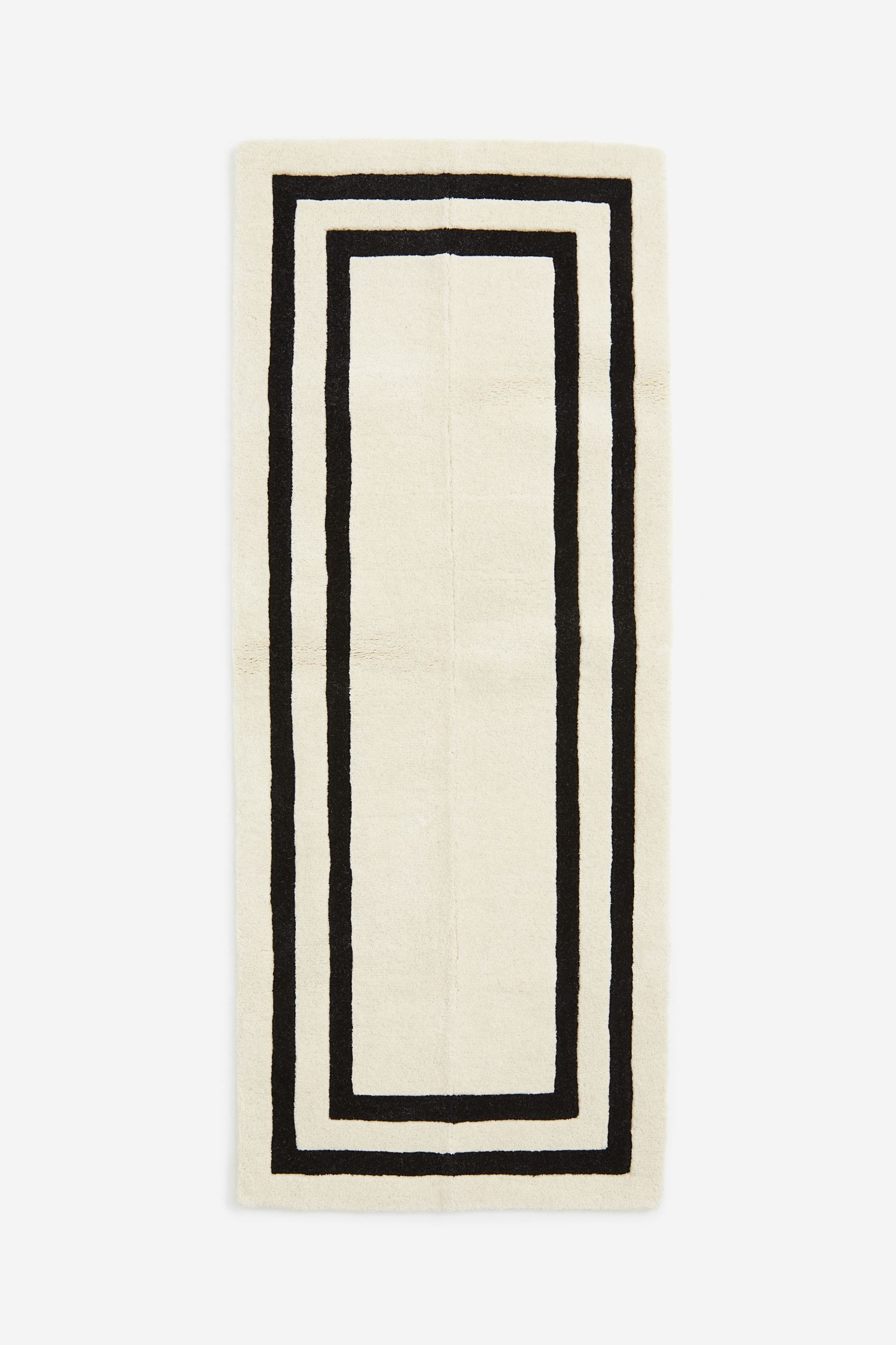 

Tufted wool rug