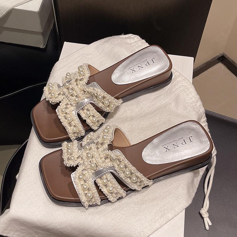 Pearl French holiday cool slippers women's summer wear 2025 new flat-bottomed non-slip with skirt gentle one-word slippers