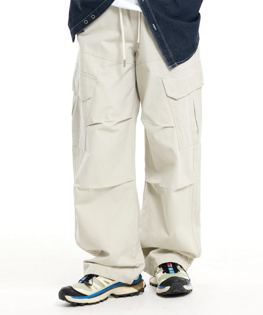 CREAM SODA LAB Diagonal Cut Field Parachute Cargo Pants Ivory