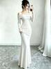 Autumn and winter new golden velvet one-word off-the-shoulder long-sleeved long-hip dress temperament women's skirt