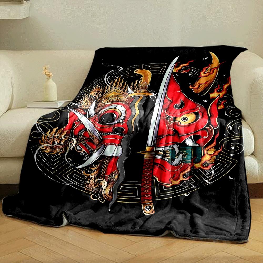Fiery red demon masks split by swords, surrounded by ornate golden designs. for all seasons blanket lunch break throw gift