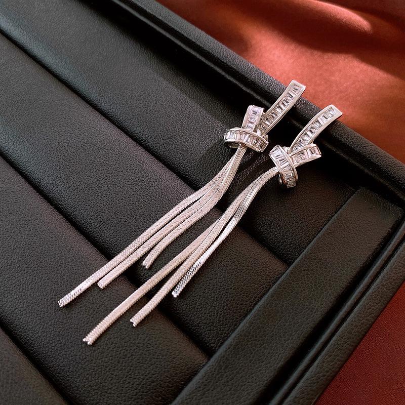 Premium metal knotted zircon fringed silver needle earrings real gold electroplating simple and elegant niche earrings