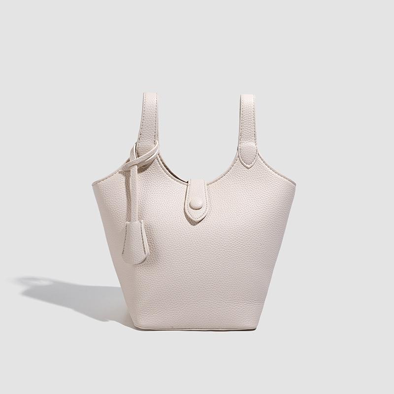 

2025 personalized Korean fashion bucket bag new simple shoulder bag texture trendy commuter messenger bag women s bag
