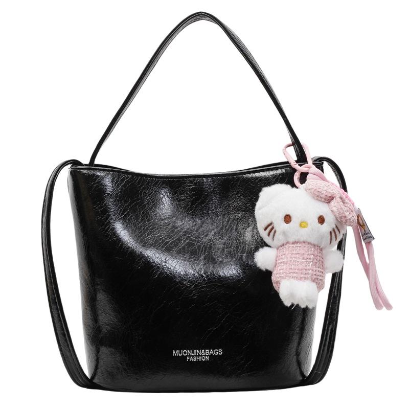 Popular simple oil wax leather casual versatile portable bucket bag fashionable daily commute solid color messenger women s bag