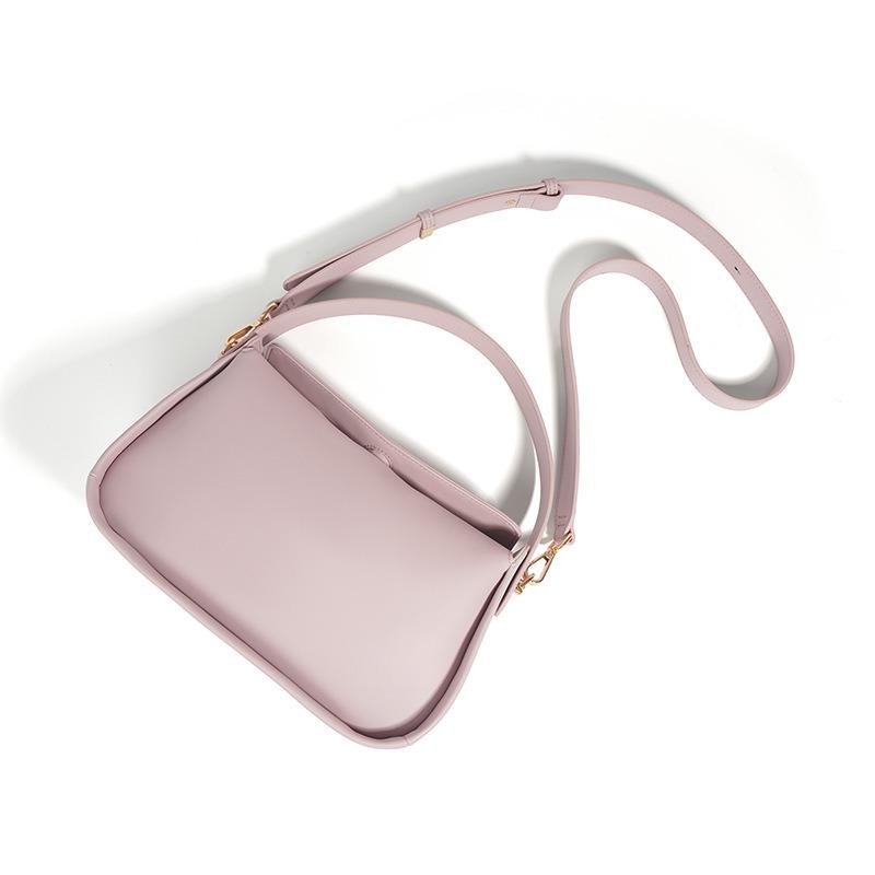 Leather commuter versatile hand carry office worker niche handbag women's high-end sense bag women's messenger dumpling bag