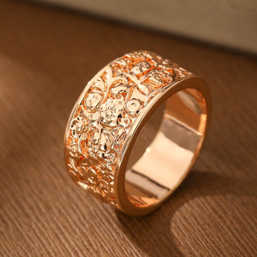 Retro-style relief flower-shaped ring made of copper, a ladies' jewelry item suitable for both formal events and daily wear.
