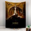 A sword piercing a glowing doorway with a figure atop a rocky hill. Patterned tapestry for bedroom and living room home decor