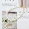 Charming Pet Collar with Emerald Pendant and Faux Pearls - Elegant Accessory for Cats and Dogs