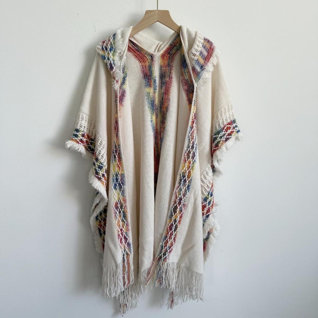 Ethnic Style Hooded Tassel Shawl Cloak – Women's Warm Knitted Cape, 2025 Collection.