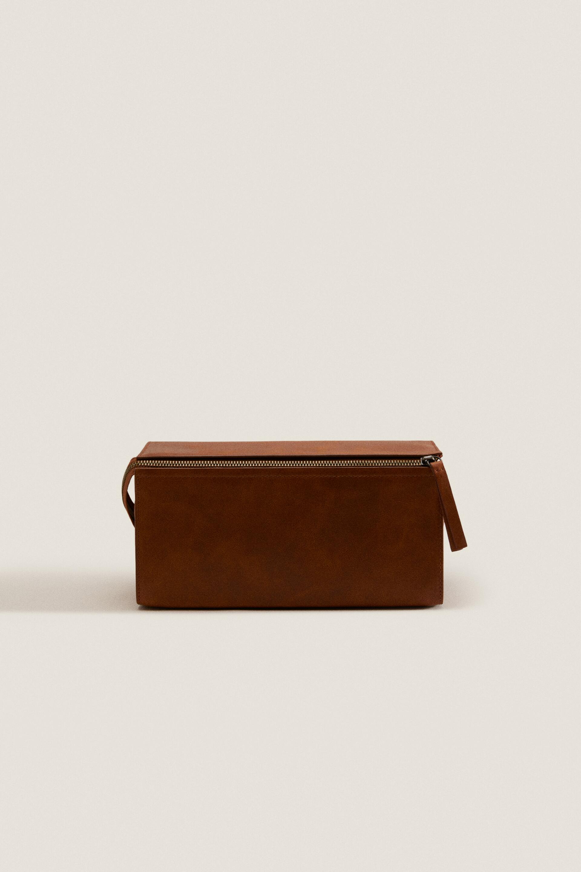 

Large rigid leather toiletry bag