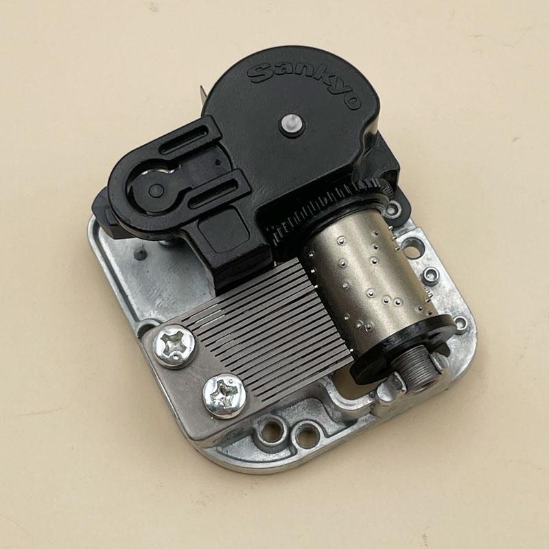 Boutique Antiques Gifts Sankyo Silver Wind Up Rotating Musical Clock Movement Music Box Mechanism  18 Note for DIY Music Box