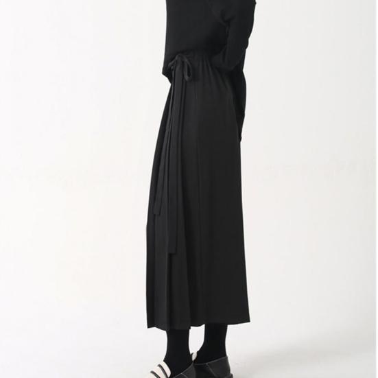 Pantaloni da donna stile scuro nero tinta unita plissettati finti due pezzi irregolari high street larghi gamba larga casual individuali lunghezza a metà polpaccio pantaloni culottes