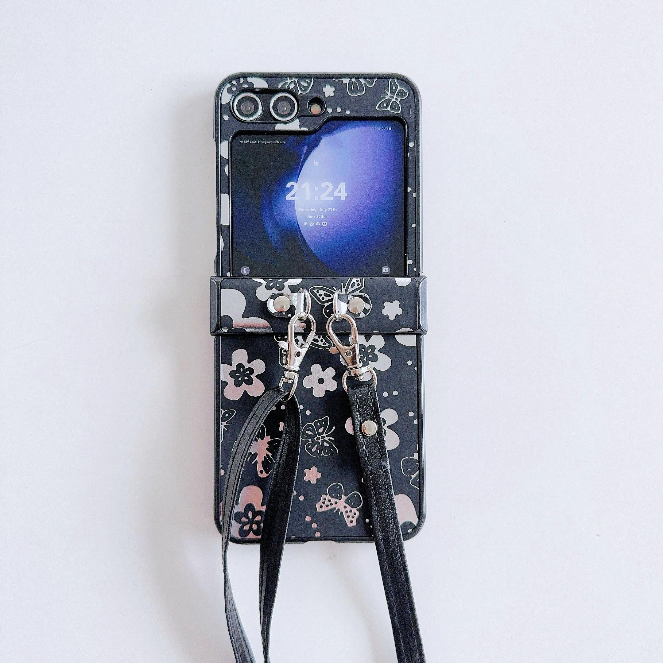 

For Samsung Galaxy Z Flip6 5G Butterfly and Flower Pattern PU Leather Coated PC Phone Cover with Crossbody Strap Black