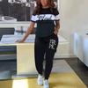 Large size women's two-piece set, 1D printing casual contrasting color round neck short-sleeved top and pants set, pants pocket.