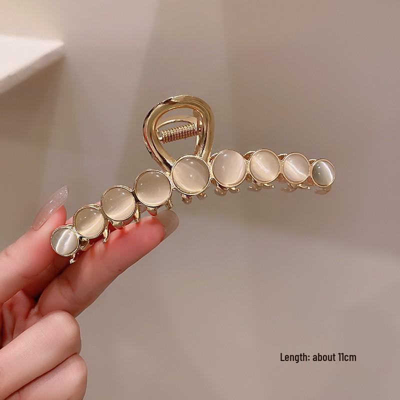 

Заколка для волос «Кошачий глаз»: Большая заколка-краб для волос на 2024 год.