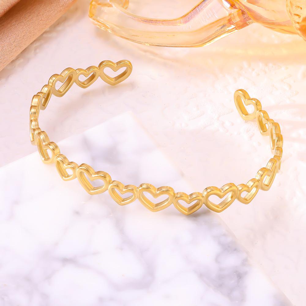Heart-to-Heart Titanium Steel Hollow Heart Bracelet - Adjustable, Simple, Trendy Women's Bangle
