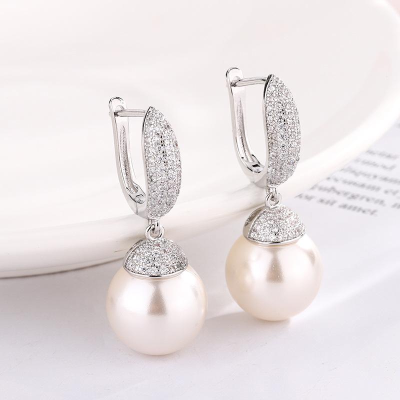 

Ювелирные изделия Медное основание Позолоченные Жемчужные серьги Серьги-гвоздики Женские 14 мм