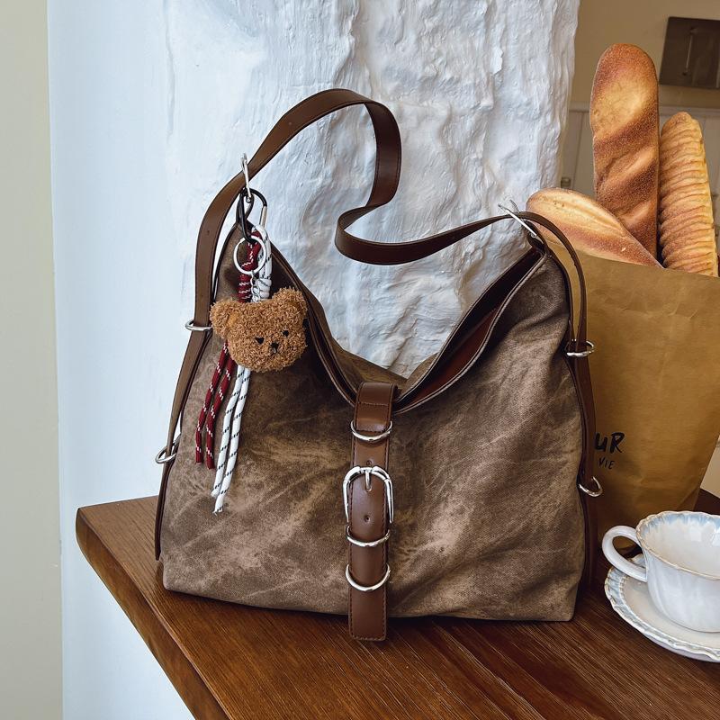 

Стильная и простая замшевая сумка большой вместимости женская 2025 осень новая ретро повседневная на плечо для работы No Pendant